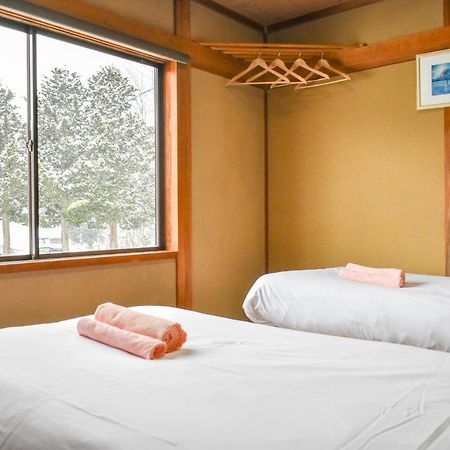 Asuka Lodge Hakuba Buitenkant foto